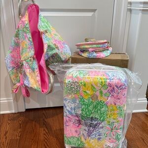 Lilly Pulitzer  3 piece luggage set, suitcase , overnight bag & cosmetic bag.